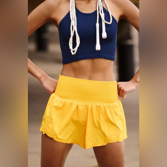 Free People Movement Carpe Diem Shorts in Yellow. - Picture 4 of 6